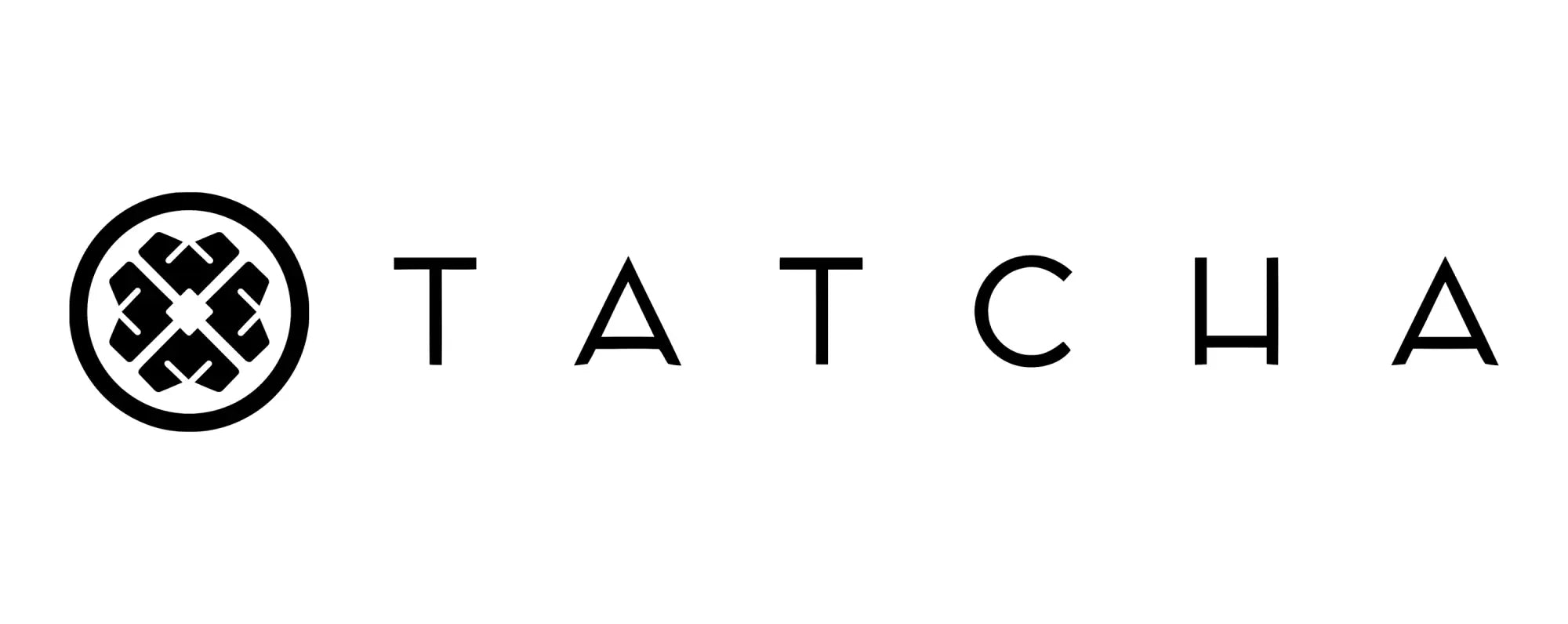 Black tatcha logo with a circular emblem featuring an intricate cross pattern and bold uppercase brand name in a collection titled tatcha.